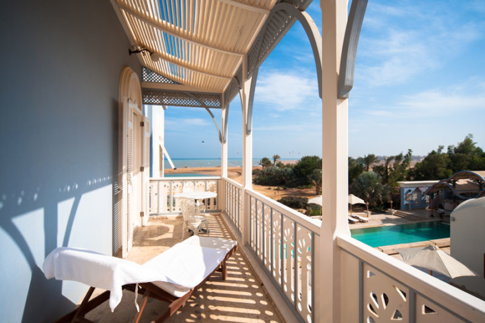 La Maison Bleue balcony view with pool